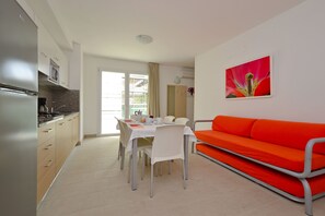 32-inch flat-screen TV with satellite channels, TV