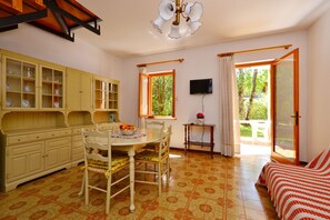 Apartment, 2 Bedrooms, Balcony | Living area | 32-inch flat-screen TV with digital channels, TV - Villa Giardino (Lignano Sabbiadoro)