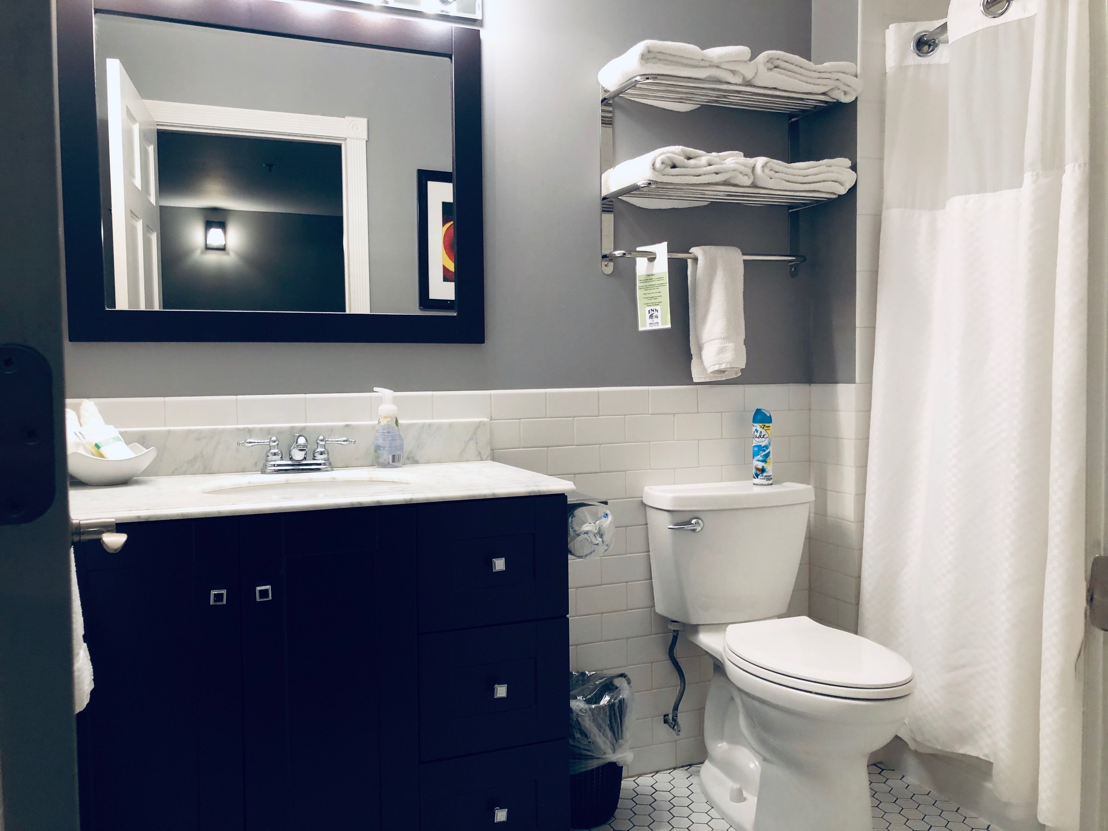 luxury suite, 1 king bed with sofa bed, non smoking, city view | bathroom | combined shower/bathtub, free toiletries, hair dryer, towels