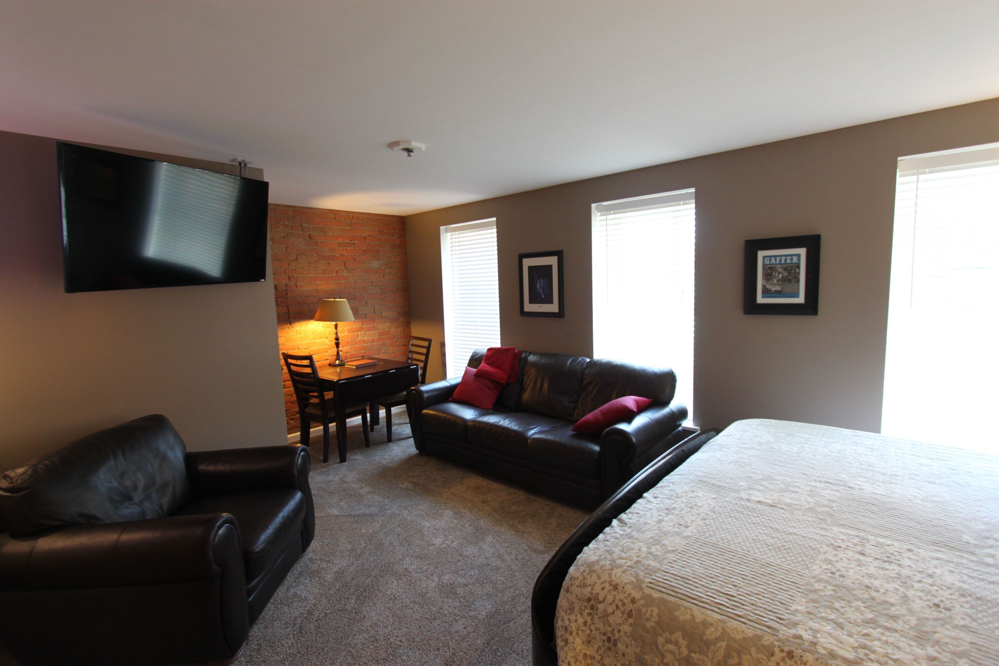 deluxe room, 1 king bed with sofa bed, non smoking, city view | individually decorated, individually furnished, desk, iron/ironing board