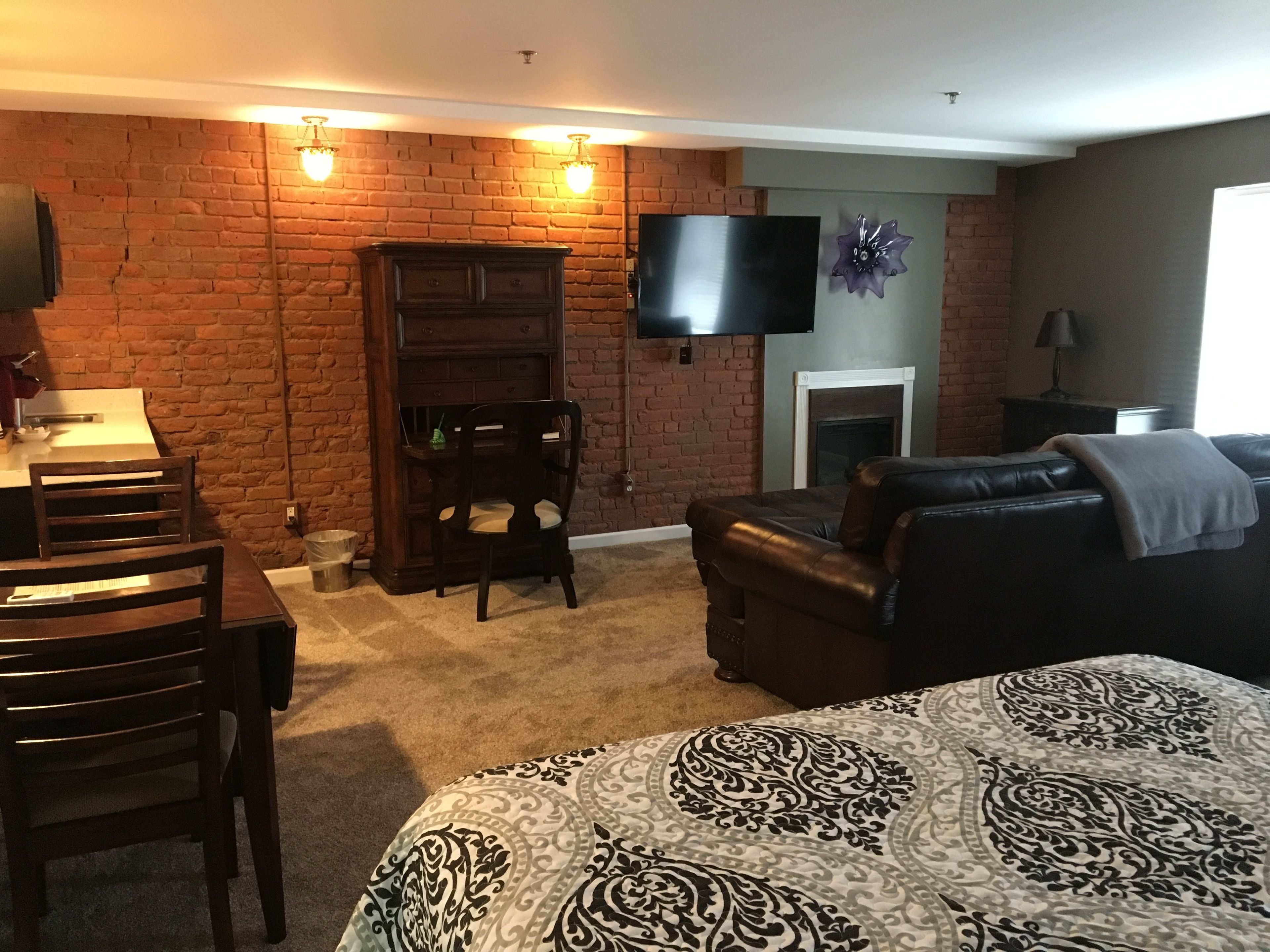 deluxe room, 2 queen beds, non smoking | individually decorated, individually furnished, desk, iron/ironing board