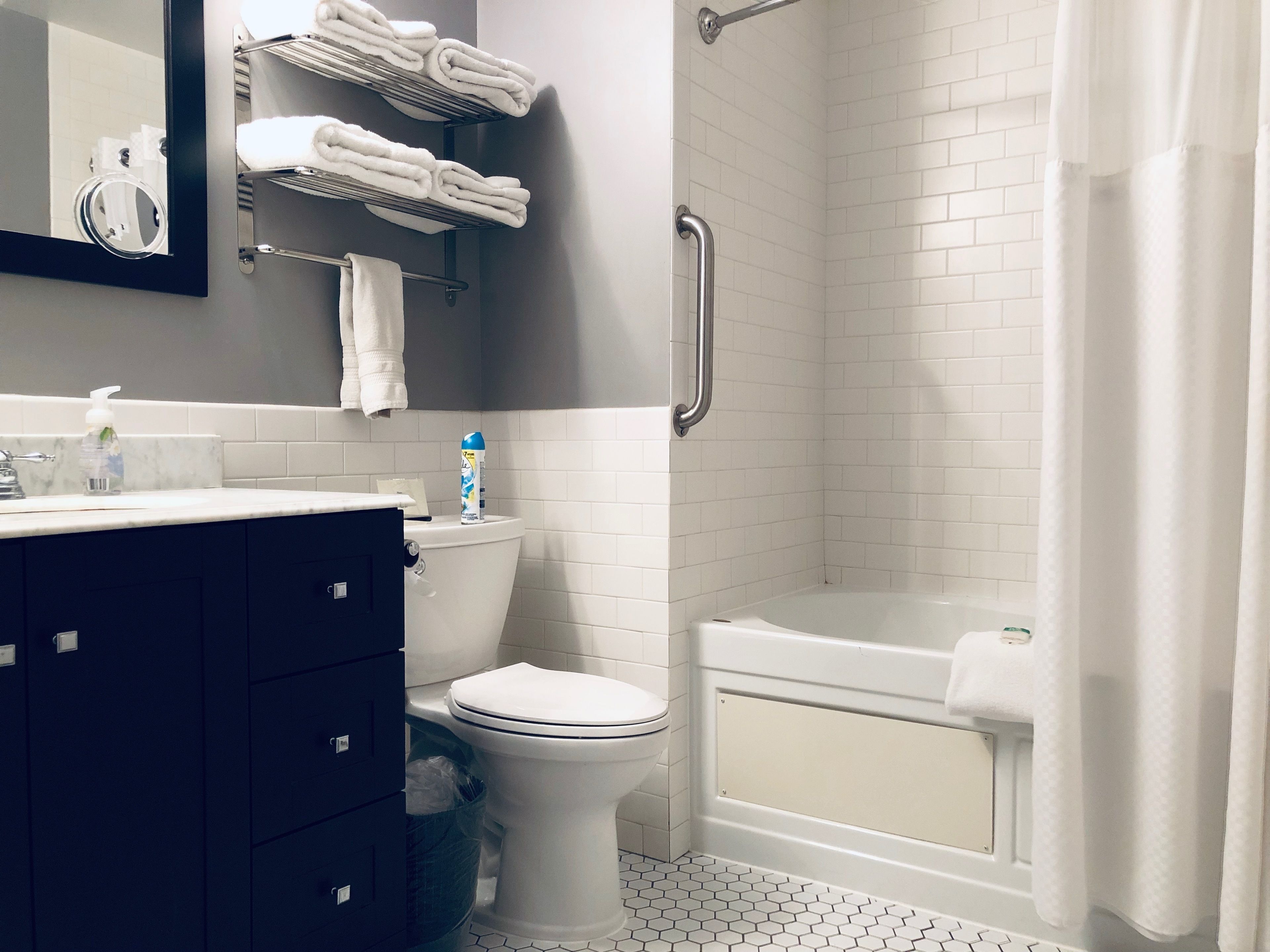 classic room, 2 queen beds, non smoking | bathroom | combined shower/bathtub, free toiletries, hair dryer, towels