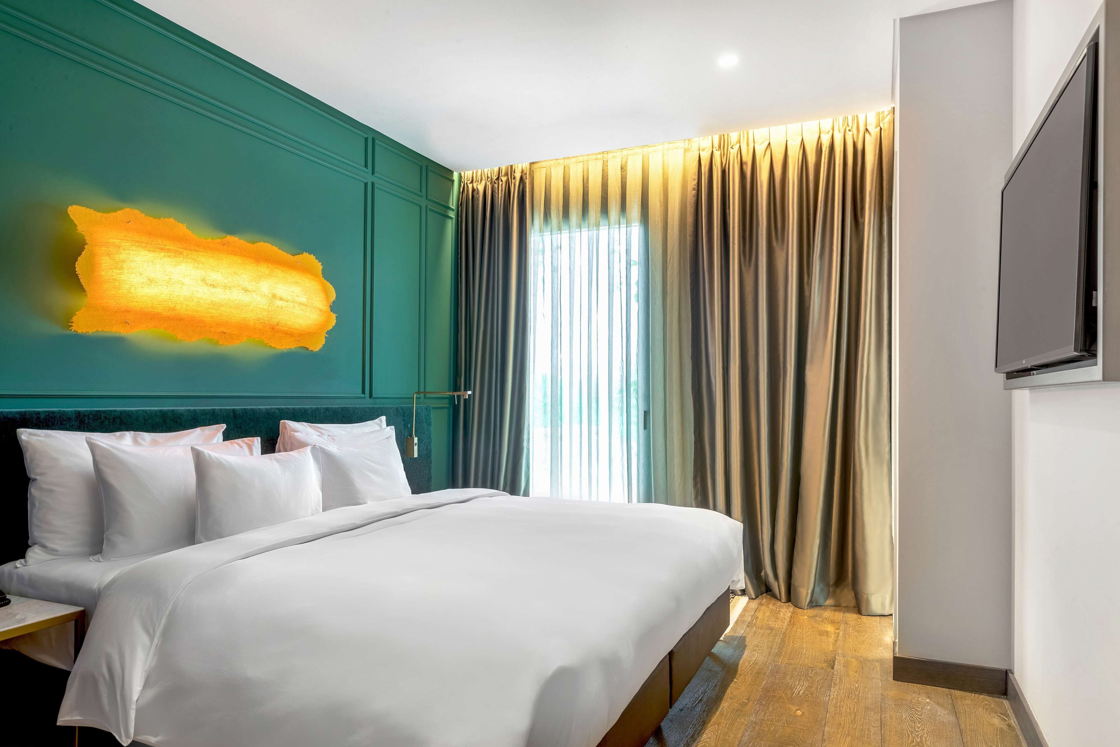 1 habitación, ropa de cama de alta calidad y minibar 