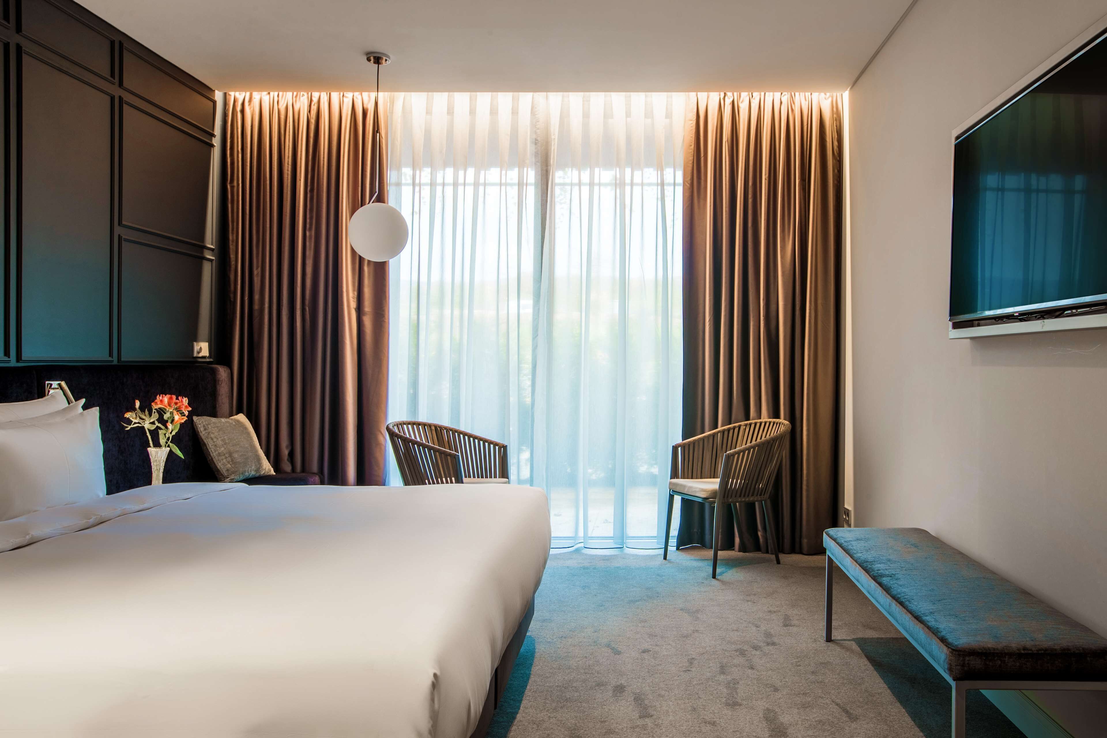 1 habitación, ropa de cama de alta calidad y minibar 