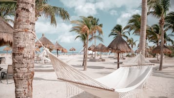 Private beach, white sand, sun-loungers, beach towels