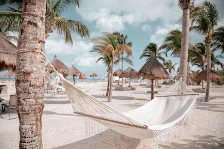 Private beach, white sand, sun loungers, beach towels. Blue Holbox Beach Front