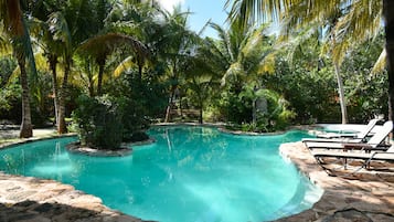 Outdoor pool, open 9:00 AM to 7:00 PM, pool umbrellas