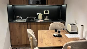 Comfort Apartment, Courtyard View | Desk, laptop workspace, free WiFi