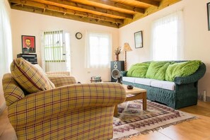 Villa, 1 King Bed, Non Smoking | Living area | Flat-screen TV - The Grand Sinopia Inn Portland (Port Antonio)