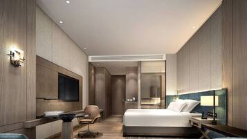 1 kamar tidur, minibar, brankas, dan meja kerja