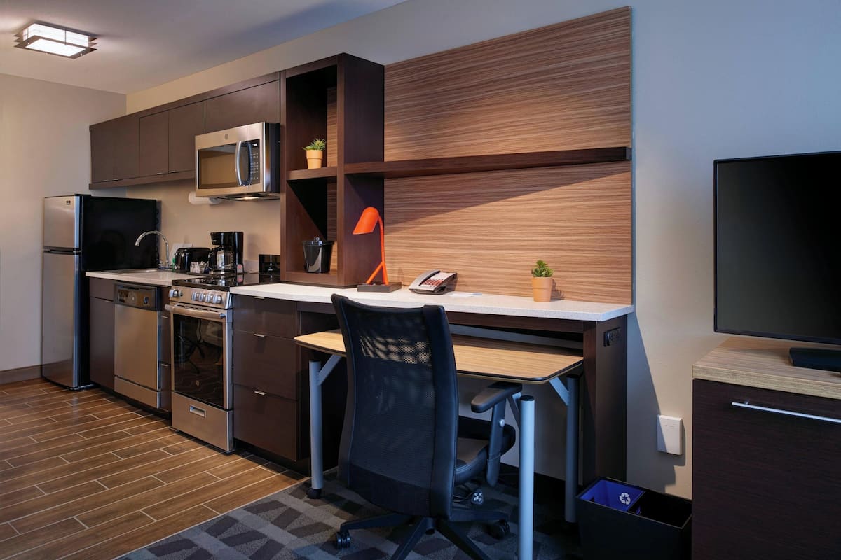 Laptop workspace, blackout curtains, iron/ironing board