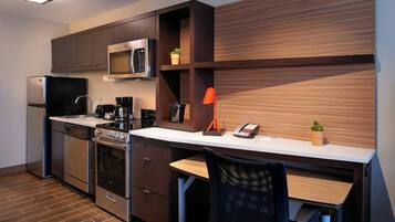 Full-sized fridge, microwave, stovetop, dishwasher