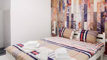 Family Apartment, Multiple Beds, Non Smoking | Iron/ironing board, free WiFi, bed sheets