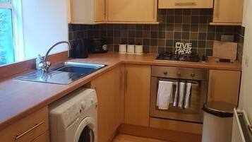 Apartment, 2 Bedrooms | Private kitchen | Full-size fridge, microwave, oven, stovetop