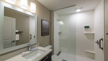Separate bathtub and shower, hair dryer, towels