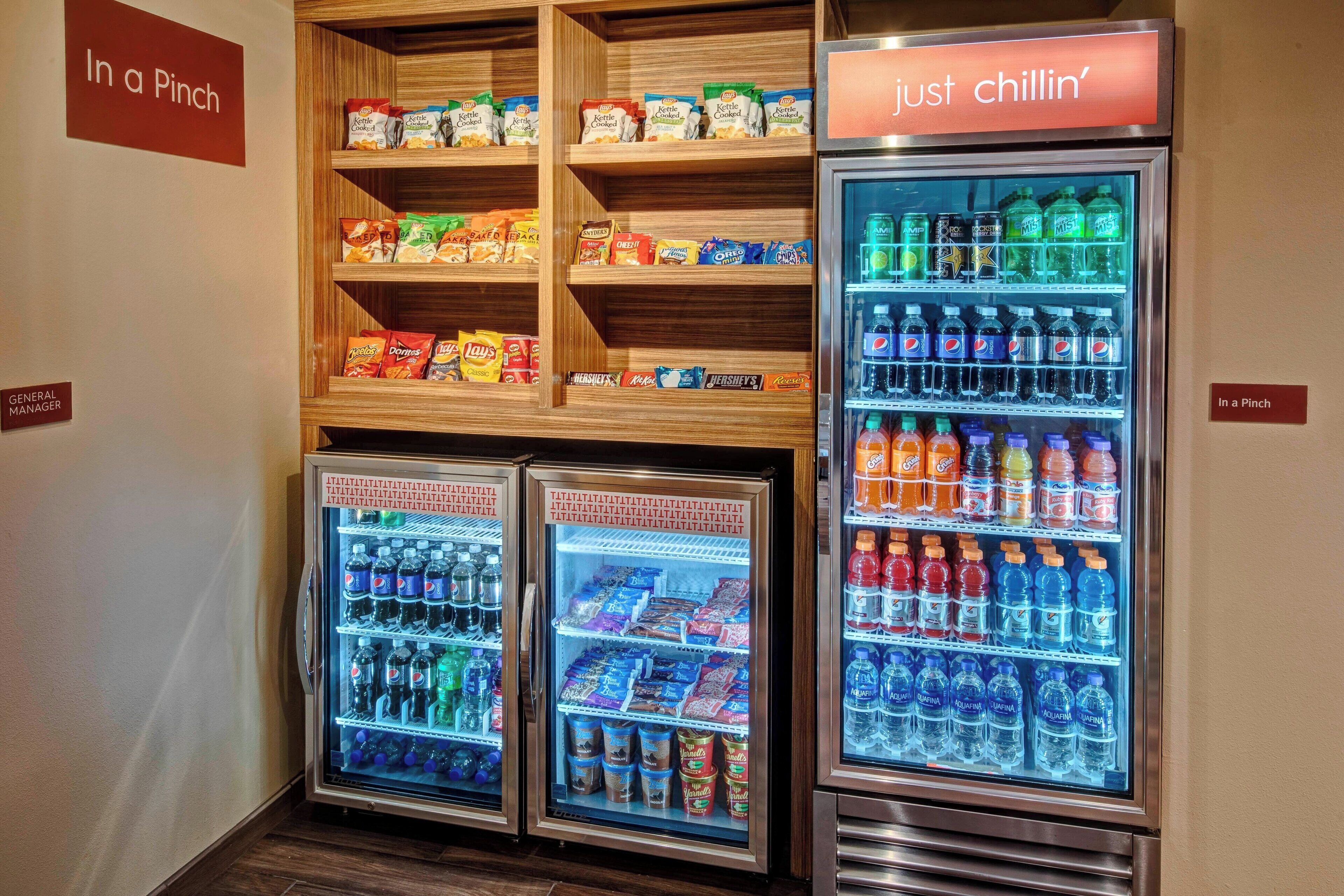 A vending machine area with snacks and drinks.