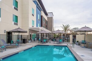 Outdoor pool, open 10:00 AM to 10:00 PM, pool umbrellas, sun loungers