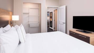 Suite, 1 Bedroom | Desk, laptop workspace, blackout drapes, iron/ironing board
