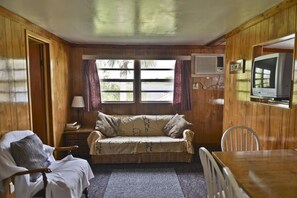 Chambre Quadruple, non-fumeur, vue lac | Coin séjour