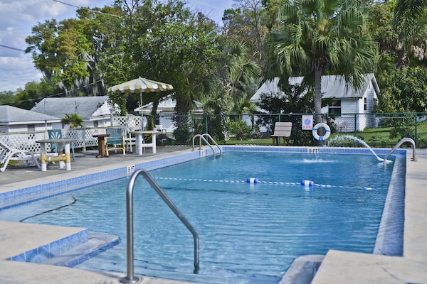 Outdoor pool, pool umbrellas, sun loungers