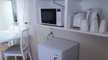 Triple Room, 3 Single Beds | 1 bedroom, down duvets, blackout curtains, iron/ironing board