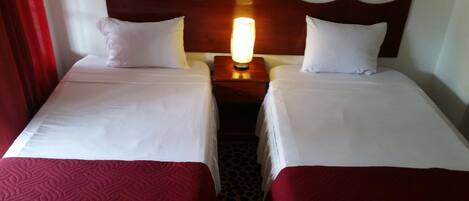 Premium bedding, desk, laptop workspace, iron/ironing board