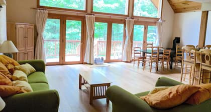 3BR Riverfront Log Home with Steam Sauna, Soaring Glass Wall & Private Forest