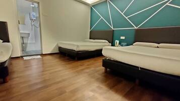 Family Room, Multiple Beds, Non Smoking, River View | Free WiFi, bed sheets