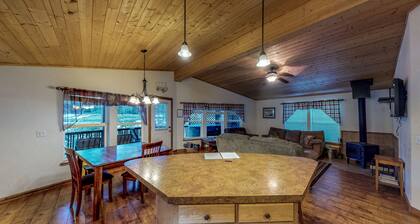 Waterfront cabin with private hot tub, furnished deck, wood stove, & free WiFi