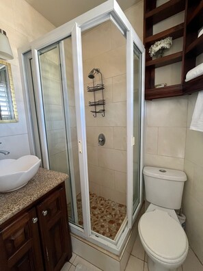 Shower, hair dryer, towels, soap