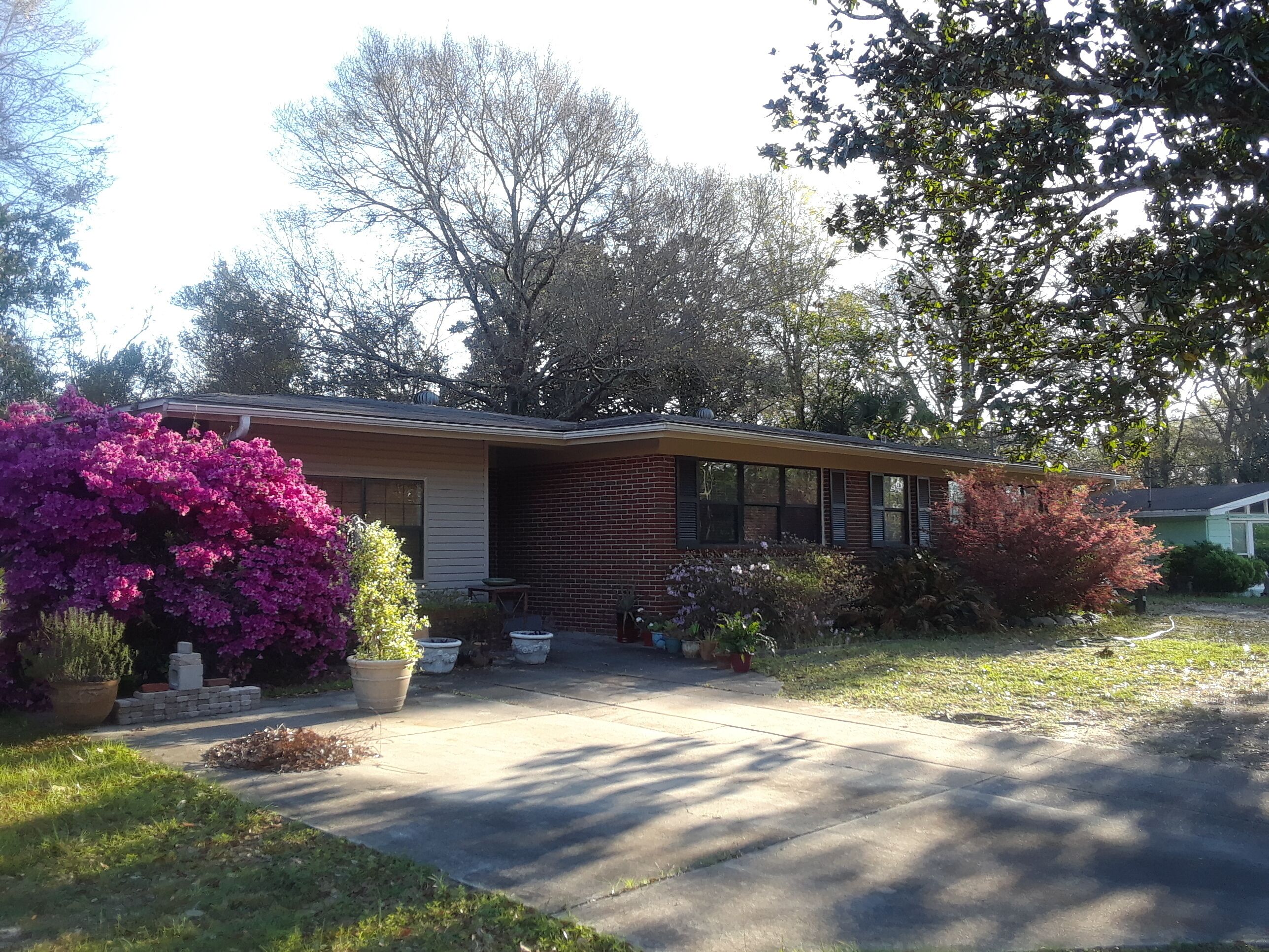 Charming ranch style home with a private patio in quiet neighborhood.