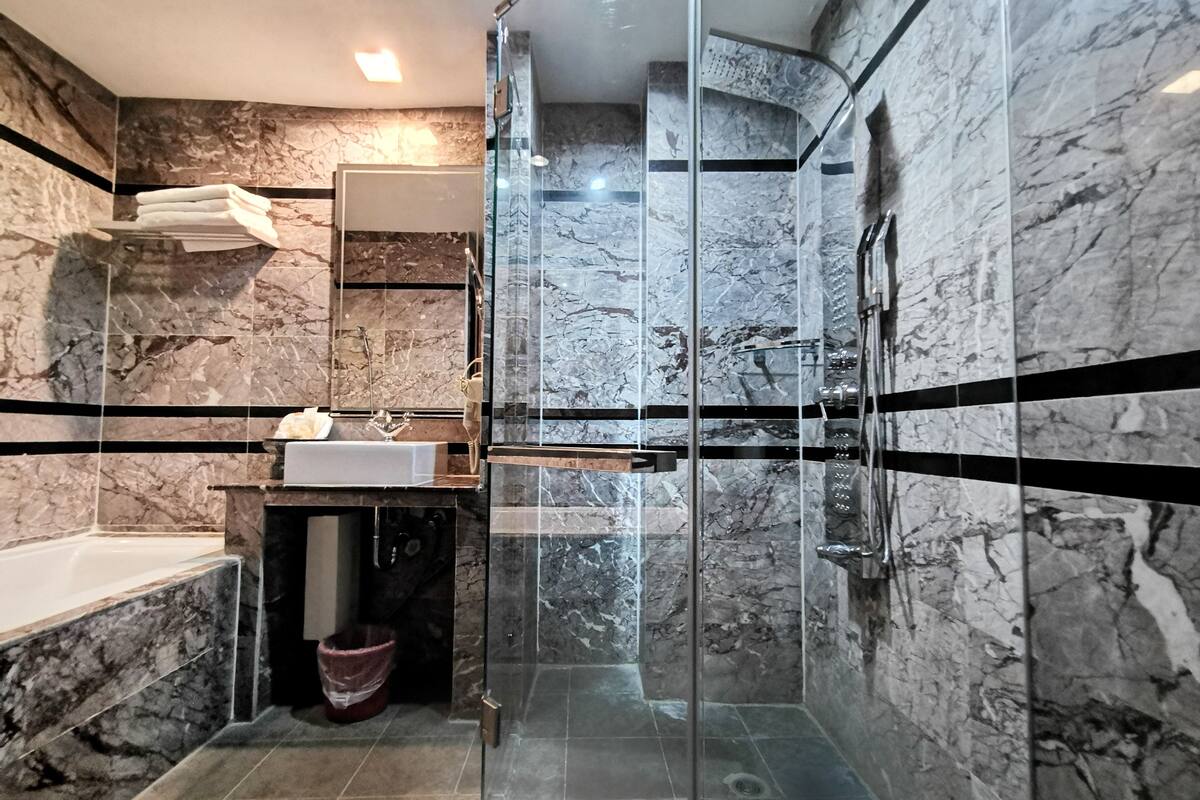 family room | bathroom | shower, free toiletries, slippers, bidet