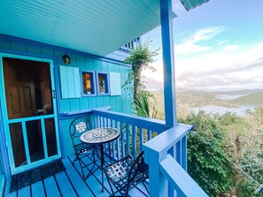 Outdoor dining - Beautiful Cottage w/Stunning View, Backup Power, Hot Tub, Family or 2 Couples  (Coral Bay)