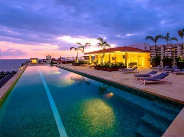 Outdoor pool, a heated pool - The Park Condo, in the beautiful Romantic Zone - 2 Bedrooms, sleeps 4 (Puerto Vallarta)