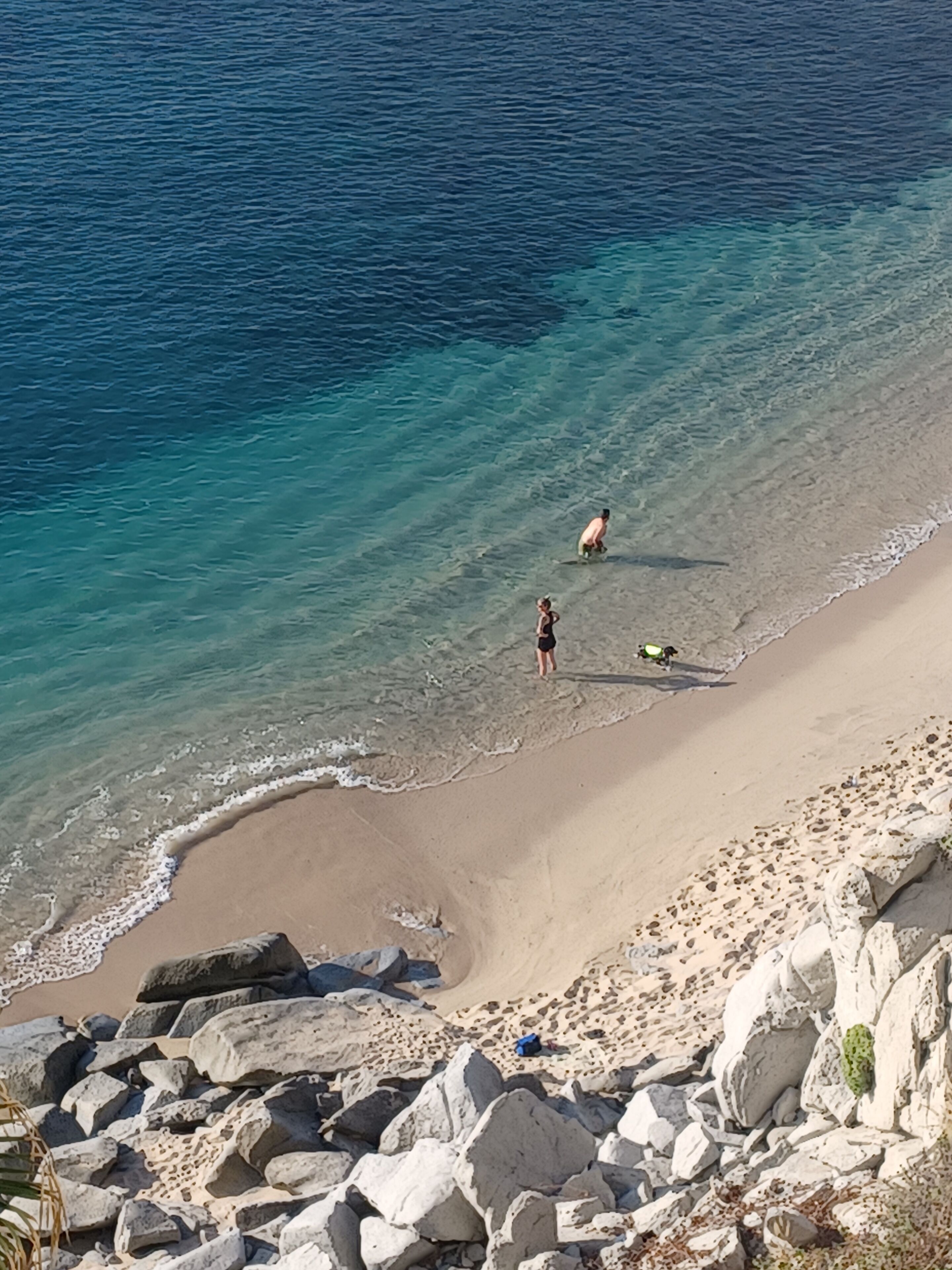 On the beach, beach towels