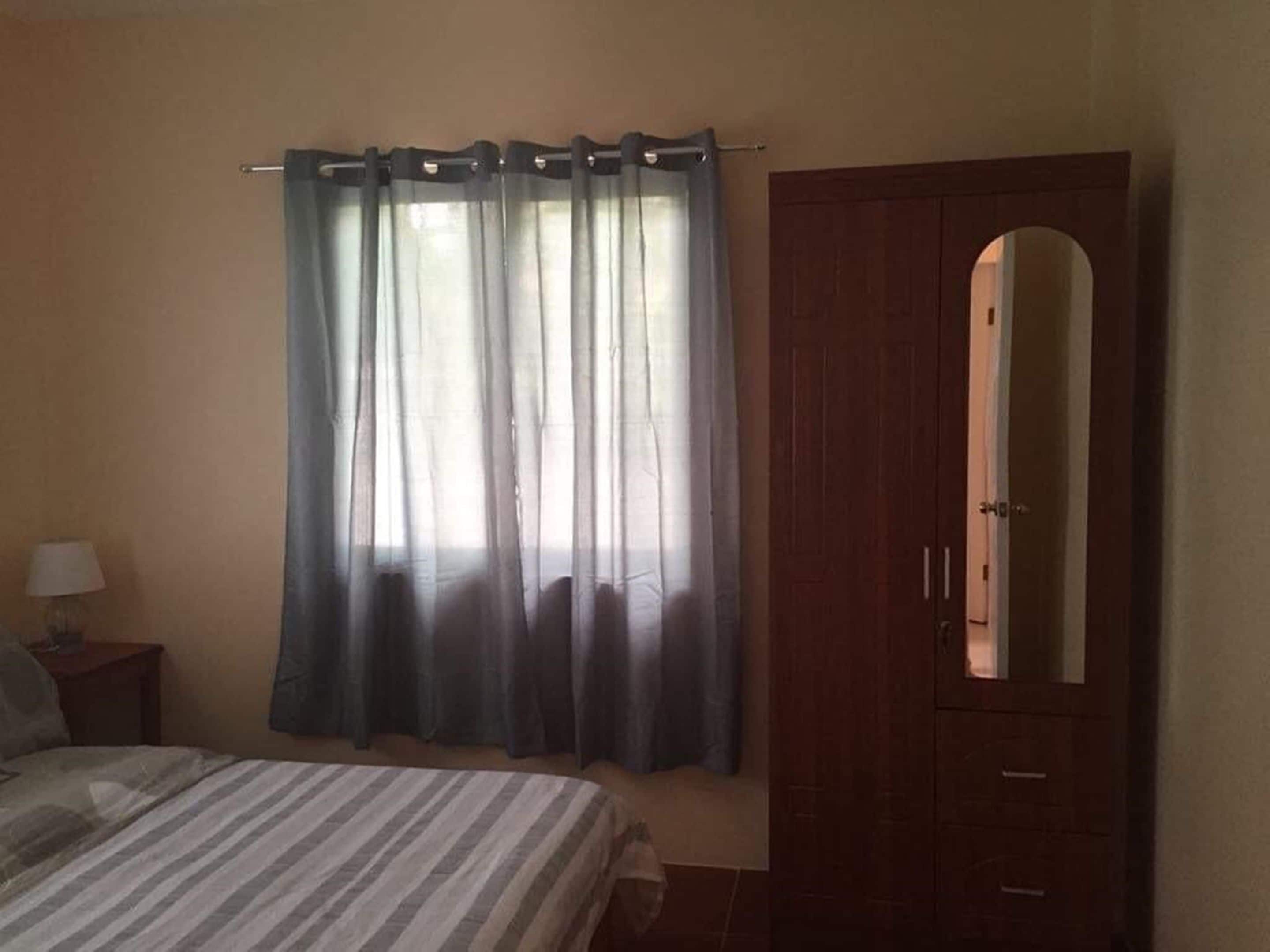 Exclusive Apartment, 2 Queen Beds, Non Smoking | 2 bedrooms, individually decorated, iron/ironing board, free WiFi