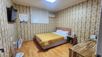 Quarto standard, 1 cama Queen | Cortinas blackout, Wi-Fi de cortesia, roupa de cama