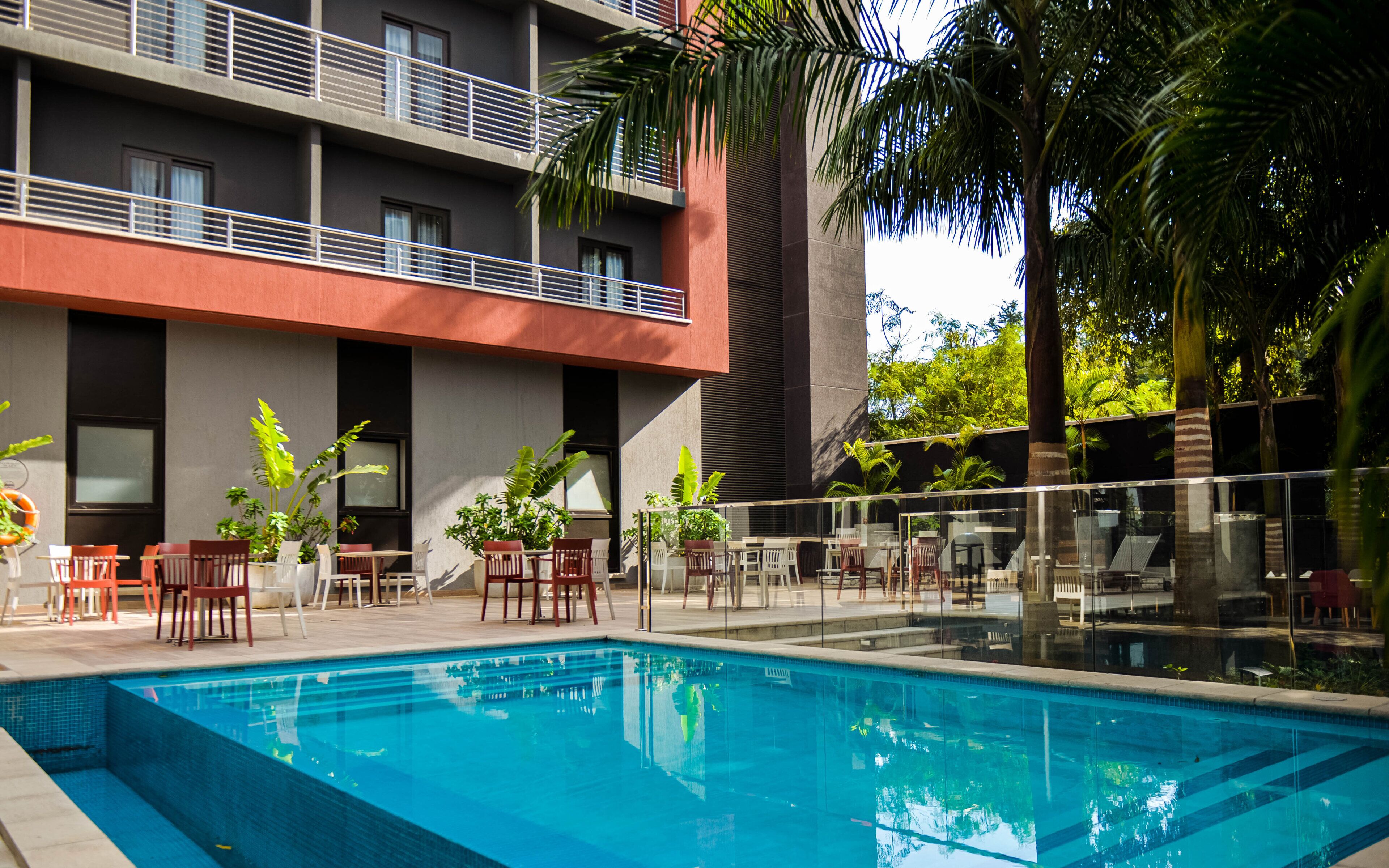 Outdoor pool, open 6:00 AM to 6:00 PM, pool umbrellas, sun loungers