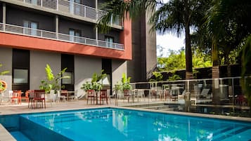 Outdoor pool, open 6:00 AM to 6:00 PM, pool umbrellas, sun loungers