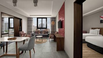 Premium bedding, down comforters, memory foam beds, minibar