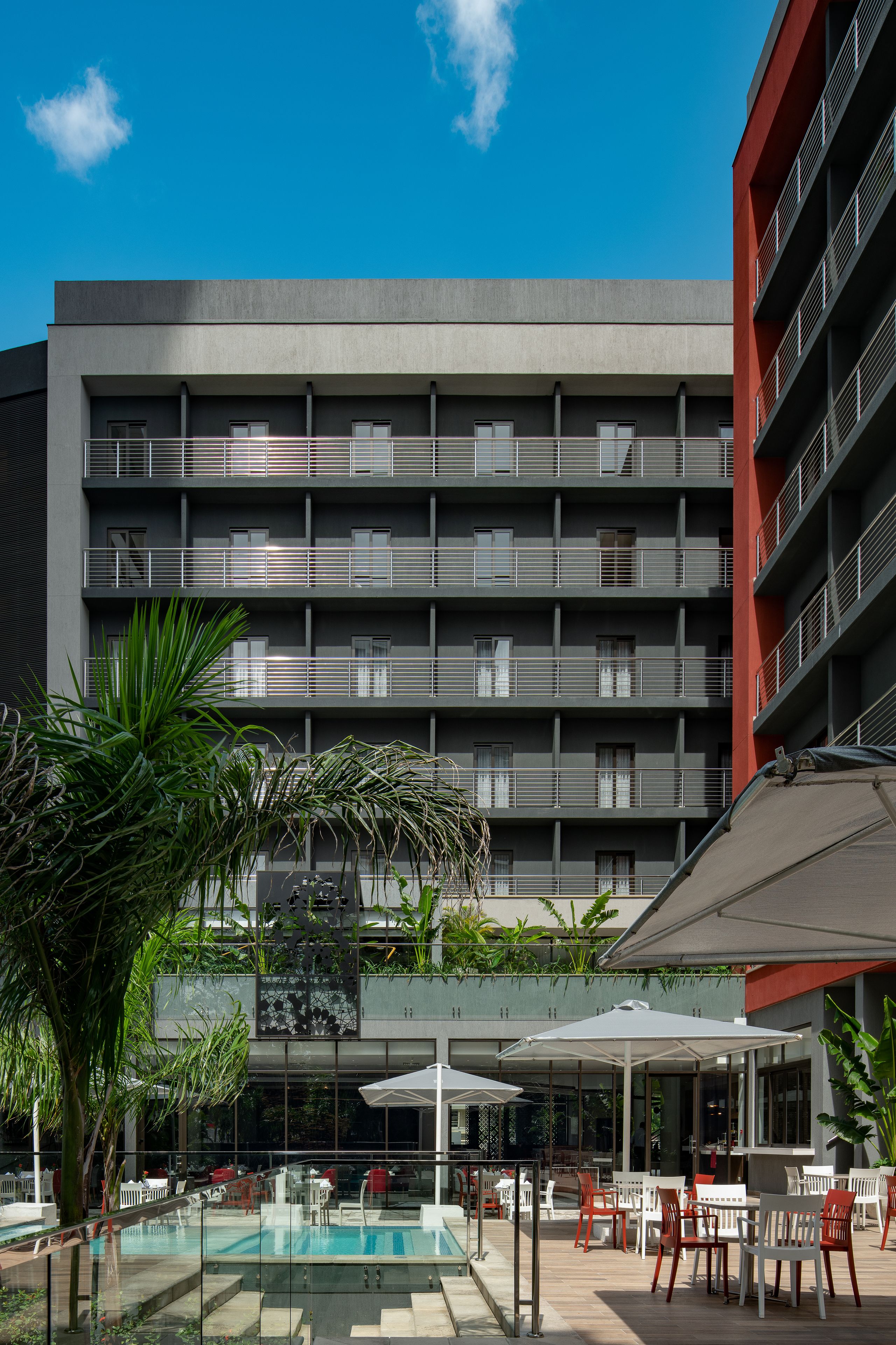 Outdoor pool, open 6:00 AM to 6:00 PM, pool umbrellas, sun loungers