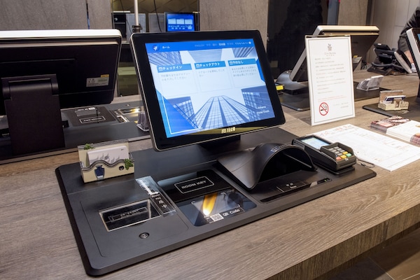 Check-in/check-out kiosk