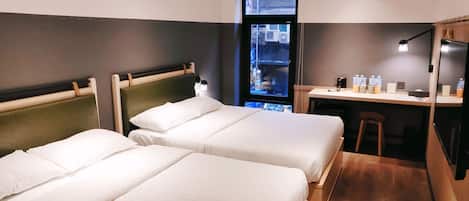 Deluxe Quadruple Room | In-room safe, desk, free WiFi, bed sheets
