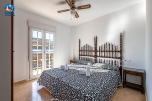 Appartamento, 2 camere da letto, vista piscina | 2 camere, ferro/asse da stiro, culle/letti per bambini (a pagamento)