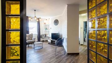 Apartemen Deluks | Area keluarga | TV layar datar