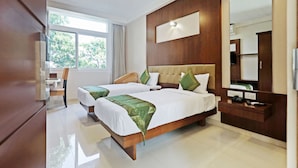 Standard Room | Desk, iron/ironing board (on request), WiFi (free), bed sheets - Treebo Akshaya Bull Temple (Bengaluru)