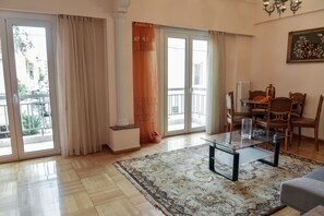 Apartment | Living area | 35-inch flat-screen TV with satellite channels, TV - Cozy & Spacious Apartment in Central (Athens)
