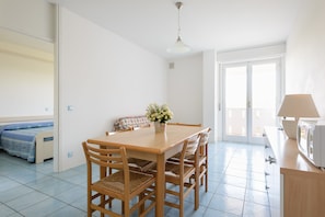 23-inch flat-screen TV with satellite channels, TV