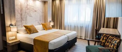 Blackout drapes, iron/ironing board, free WiFi, bed sheets