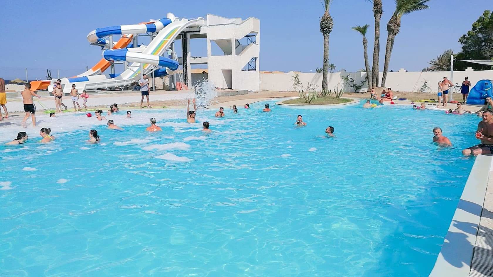 2 outdoor pools, pool umbrellas, pool loungers